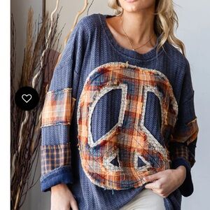 OH665–OLI & HALI Thermal Cozy Peace Sign Sweater with pockets.